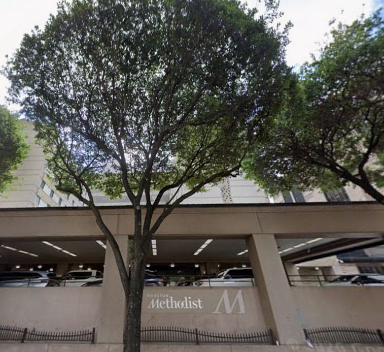 Street view of the Houston Methodist hospital entrance and parking garage where encounters are reported