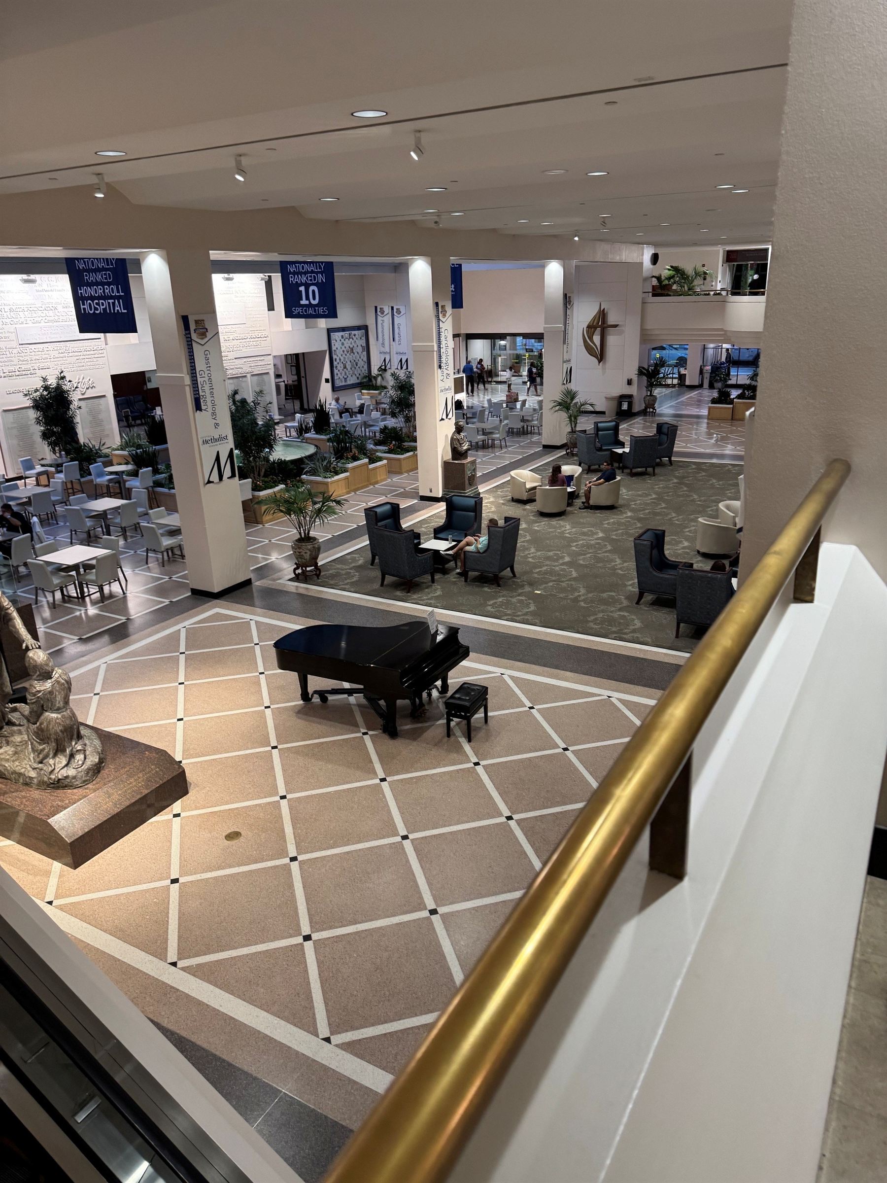 Interior lobby of Houston Methodist Hospital with seating areas where visitors wait